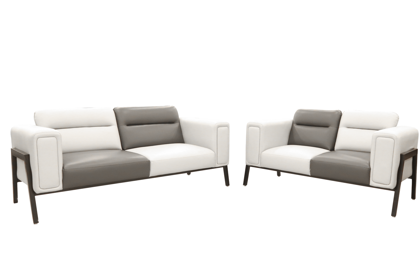 A pair of contemporary couches upholstered in gray and white leather, showcasing a sleek and elegant design.