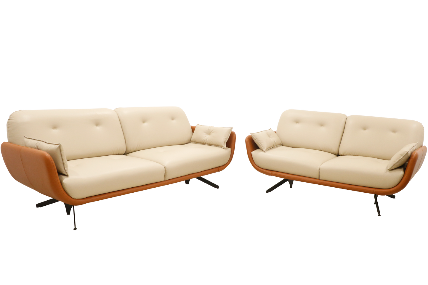 A stylish modern sofa with cream-colored cushions and a curved brown leather frame, featuring tufted backrests and angled black metal legs, isolated on a black background.