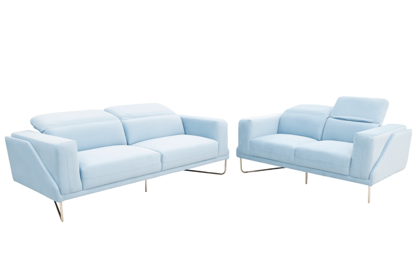 A light blue couch featuring two pillows, offering a comfortable and stylish addition to the living space.